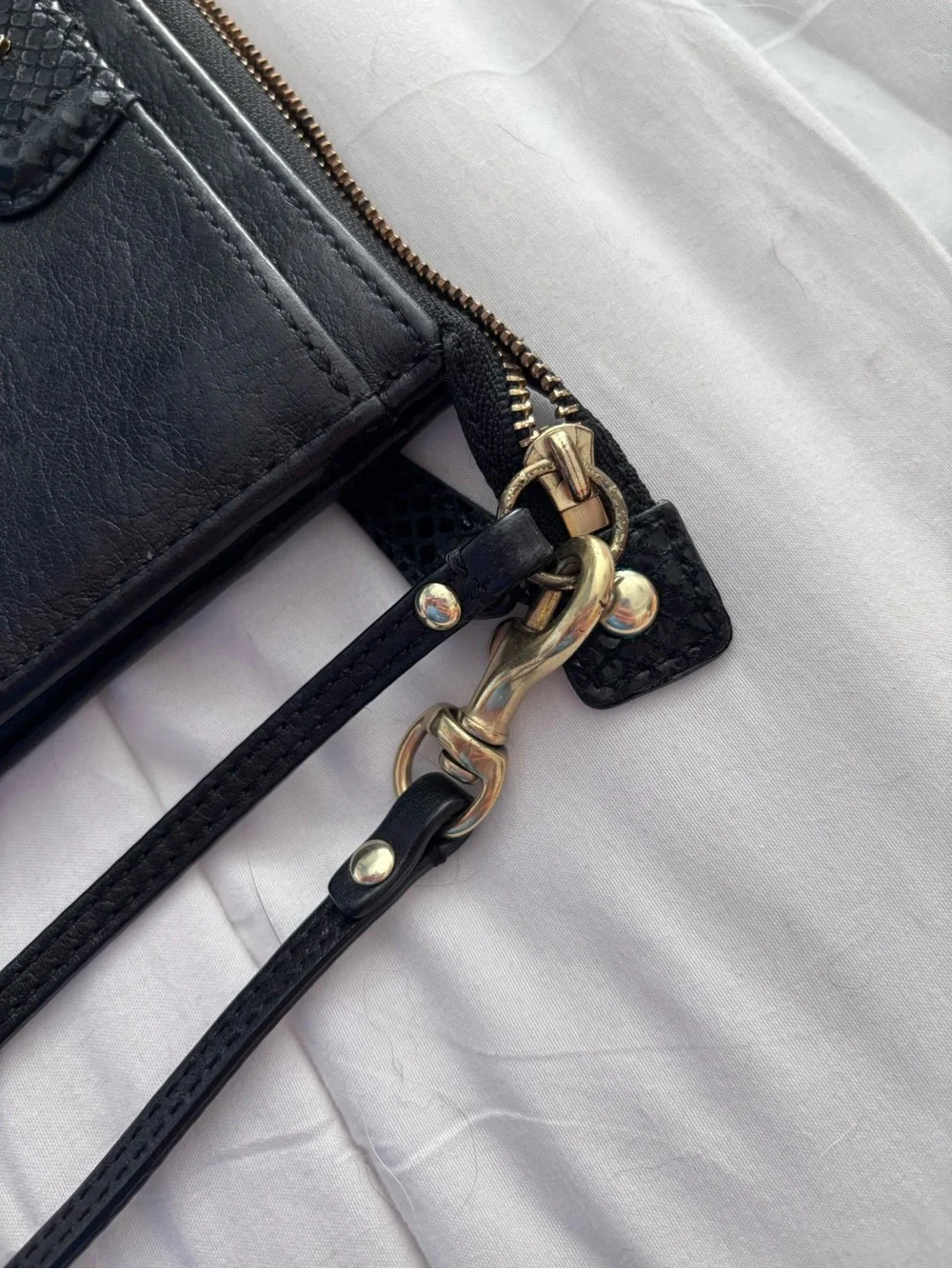 Coach Black Leather Wristlet with Gold Logo Accent